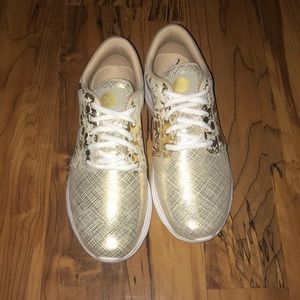 Brand new Inkkas gold tennis shoe women’s size 9